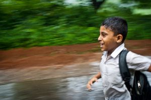 Jahangirnagar-Dhaka-Bangladesh-School-Boy-Running-Rain.jpg.jpg